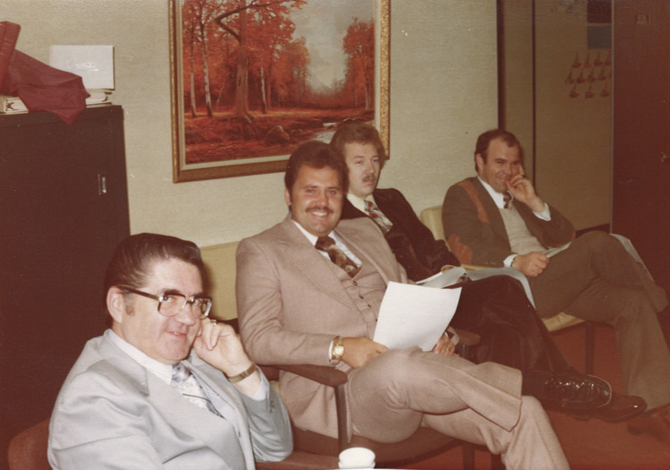 Dave Westlake with colleagues in an early business meeting