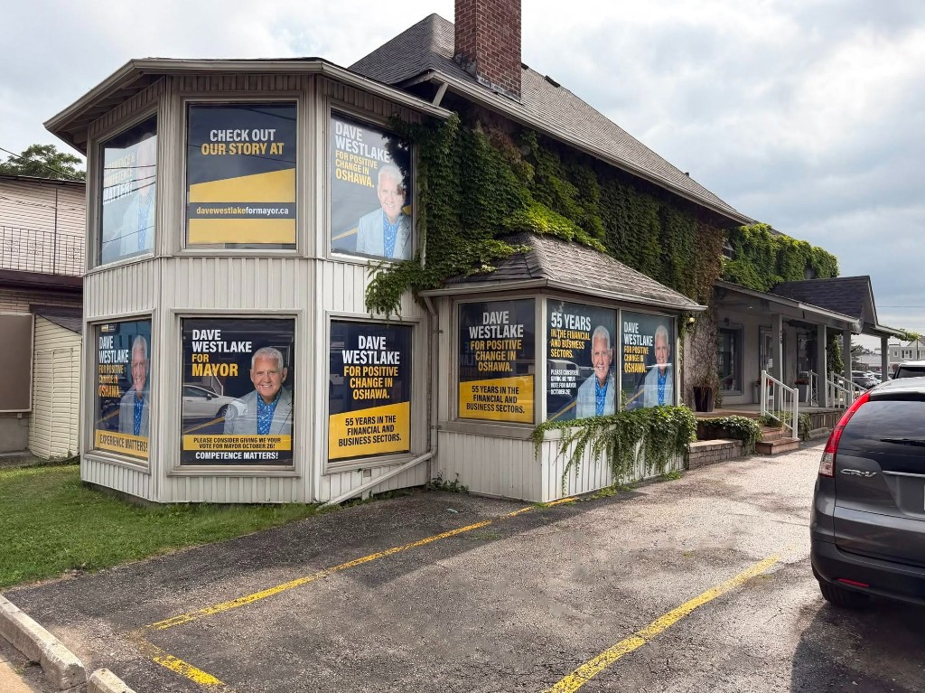 Dave Westlake campaign headquarters in Oshawa with posters in the windows