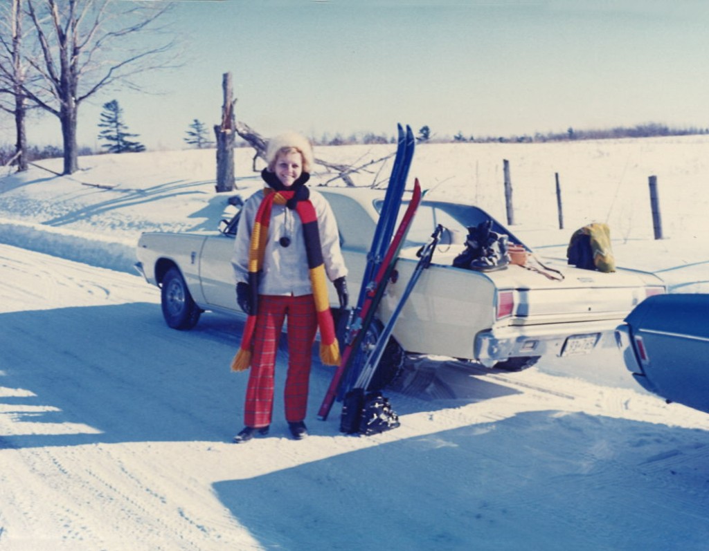 Winter day with skis and a car in the snow