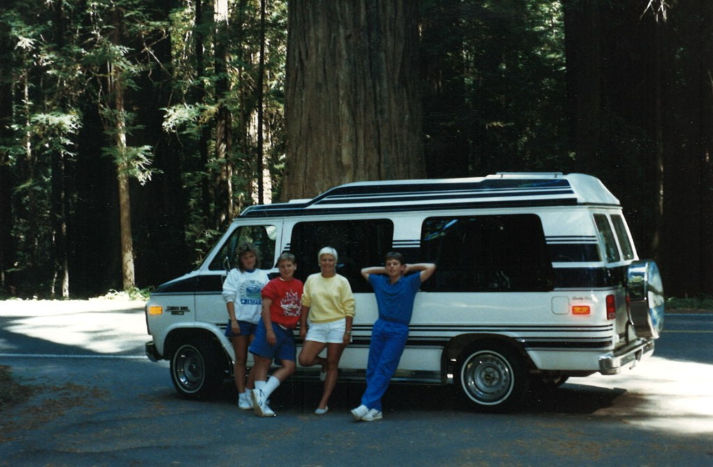Family road trip stop among the redwoods
