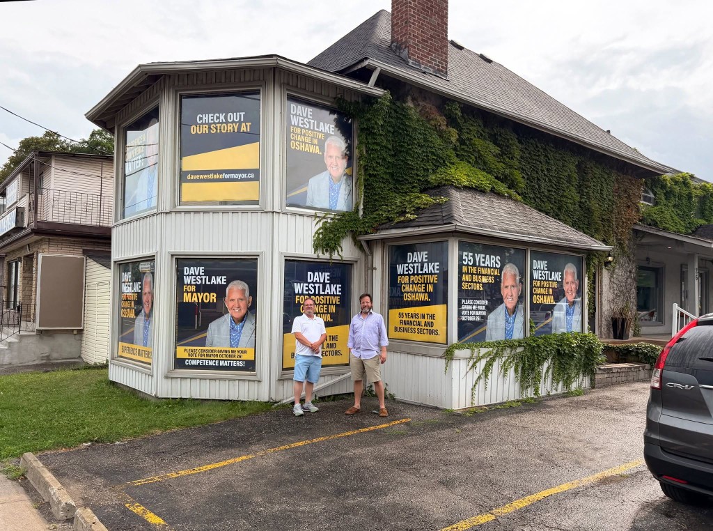 Dave Westlake campaign office on Bond Street and Ritson Road with window signs installed